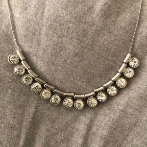 Short Silver necklace.